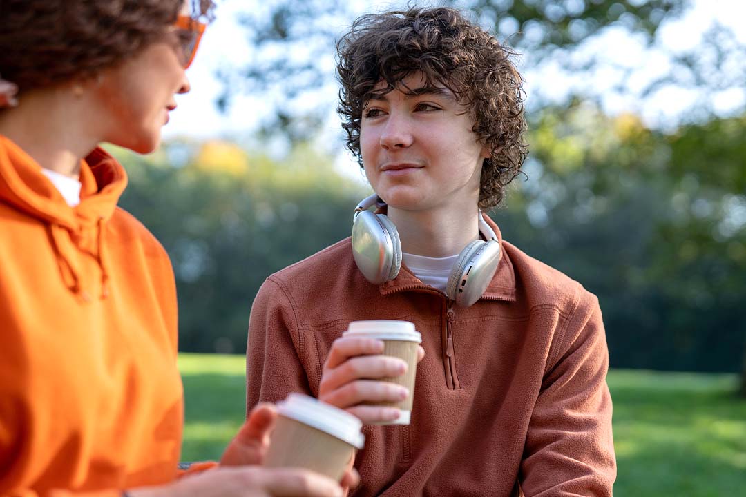 dummy_1080x720_ffffff_cccccc Two young adults having a coffee together
